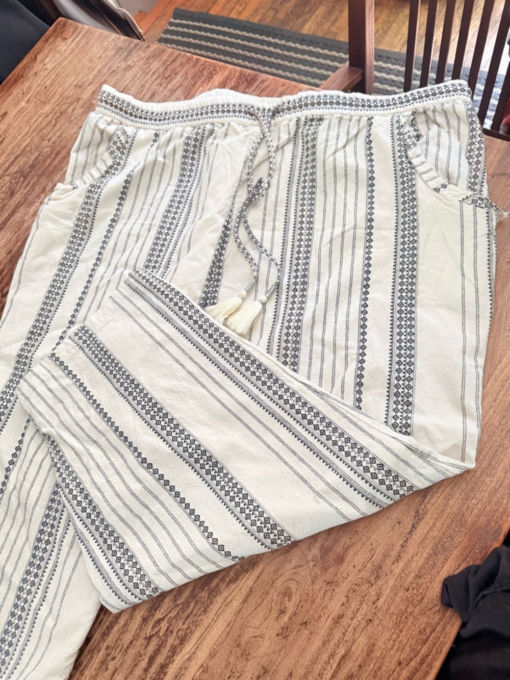 women’s Cream Woven Drawstring Pants with Black Stripe Pattern